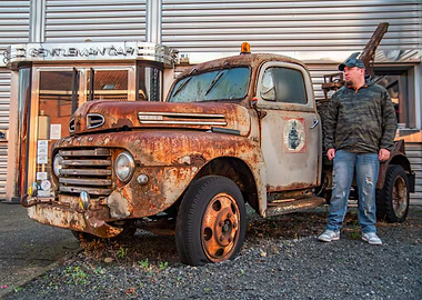Rusty Ford Tow Truck with Man