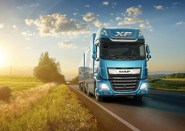 Blue DAF XF Truck on Road