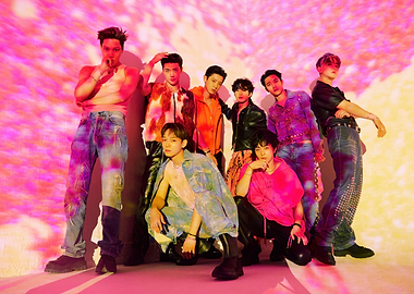 K-Pop Group Posing in Colorful Outfits