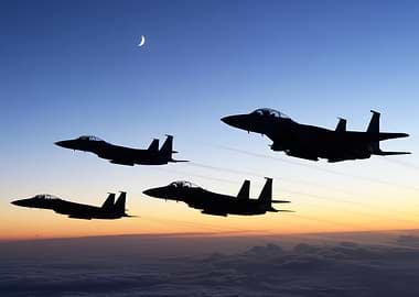F-15 Eagles in Flight at Sunset