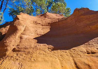 Photography of Provencal Colorado with Ochre Cliffs and Green Trees