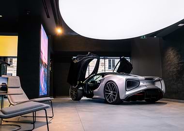 A Silver Lotus Evija in a design showroom in Paris