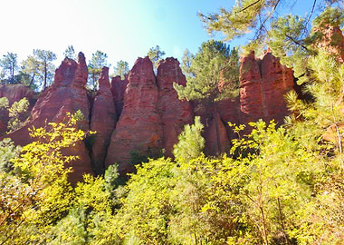 Photography of Ochre Cliffs and Greenery Trees in Provencal Colorado in France