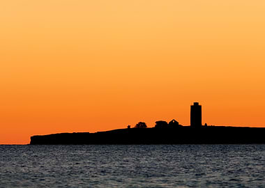 Silhouette of the old lighthouse at Östergarnsholm, Gotland, Sweden