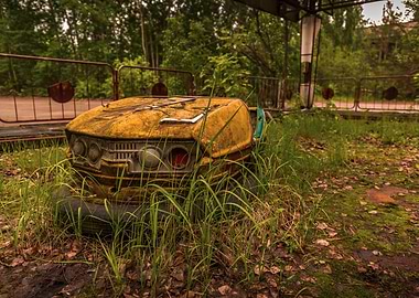 Abandoned yellow bumper car from Prypiat park