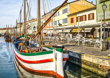 Colorful Boats Docked in Canal
