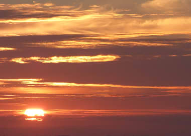 Fiery Sunset with Clouds