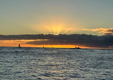 Ocean Sunset with Sailboats and Clouds