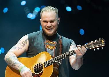 Man playing guitar on stage