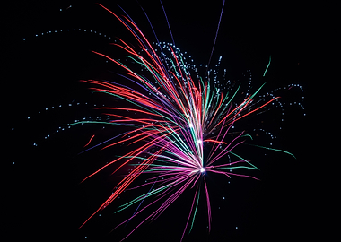 Colorful Fireworks Display Against Black Sky