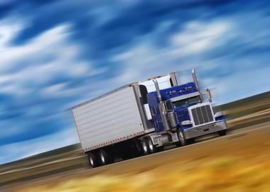 Blue Semi-Truck in Motion