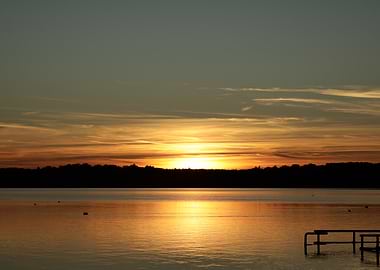 Golden Sunset Over Calm Lake