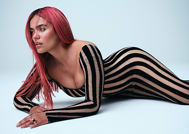 Karol G in Striped Bodysuit