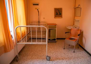 Hospital Room Interior with Bed and Chair