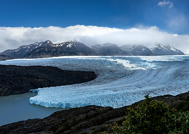 Glacier landscape with mountains and lake
