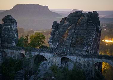 Bastei Bridge at night with the landscape of Saxon Switzerland in the background