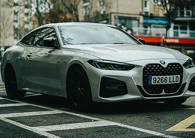 Silver BMW Coupe on City Street