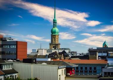 Cityscape of Dortmund with Church Tower and Blue Sky