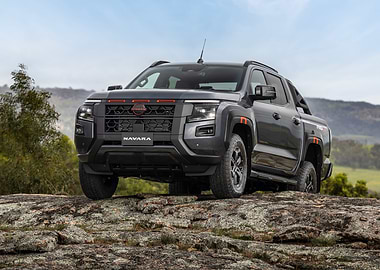 Nissan Navara pickup truck on rocks