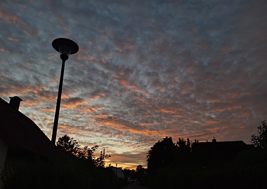 Sunset Sky with Silhouetted Lamppost