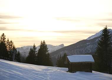 Winter landscape with cabin and mountains
