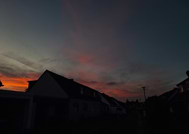 Sunset over suburban houses