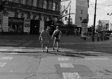 Couple Holding Hands in Cityscape