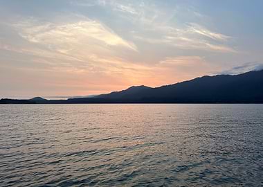 Sunset over water and mountains in Olympic National Park