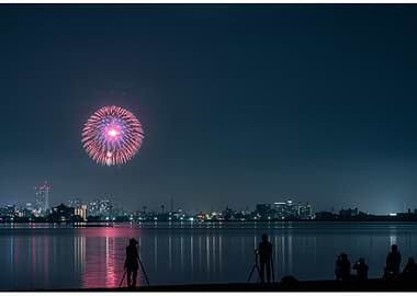 Fireworks over city at night
