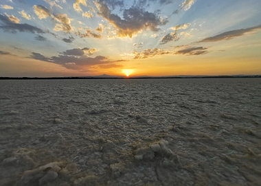 Sunset over a textured landscape