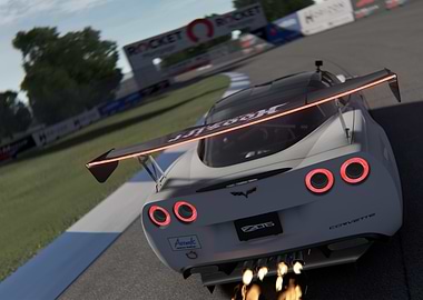 White Corvette Z06 Racing on Track