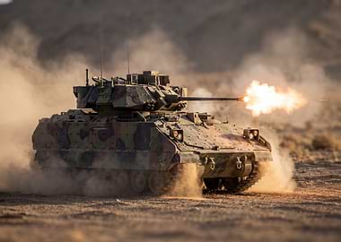 Bradley Fighting Vehicle firing weapon