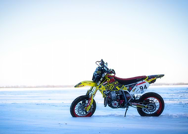 Yellow and Black Motorcycle Supermoto on Snow