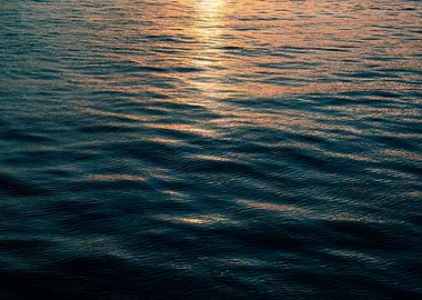 Calm Ocean Water at Sunset