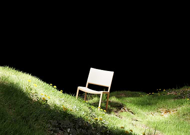 Chair on a grassy hill