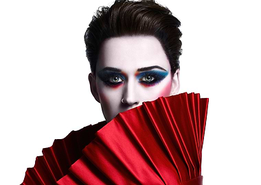 katy perry with dramatic makeup and red fan
