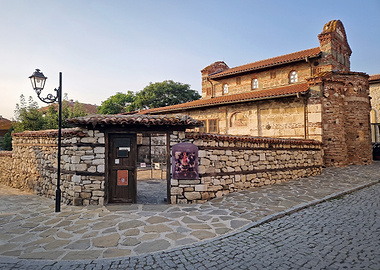 Ancient Stone Building with Red Tile Roof
