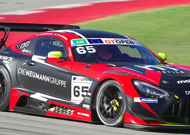 Red and Black Mercedes AMG Race Car on Track