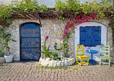 Charming Mediterranean Courtyard with Blue Accents