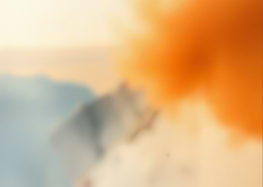 Abstract orange smoke over mountains