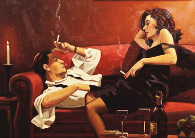 Couple smoking on a red couch