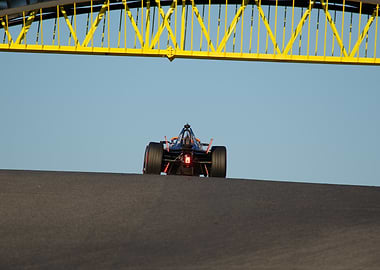 Formula E Car Under Yellow Bridge