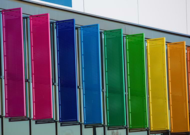 Colorful perforated panels on a building