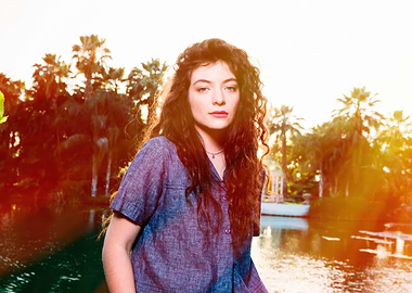 Lorde Poses by a Lake at Sunset
