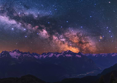 Milky Way over snow-capped mountains
