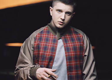 plan-b in Plaid Bomber Jacket Holding Cigarette