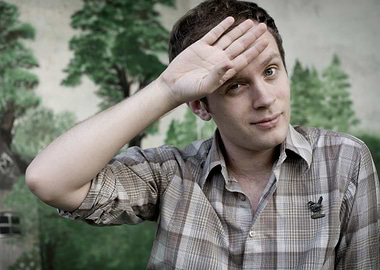jens lekman shielding eyes with hand