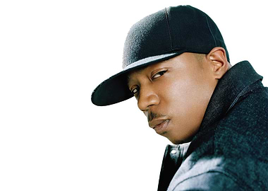 Rapper Ja Rule wearing a black baseball cap