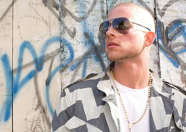 collie buddz in Sunglasses and Patterned Jacket