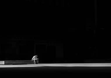 Man sitting alone in the dark